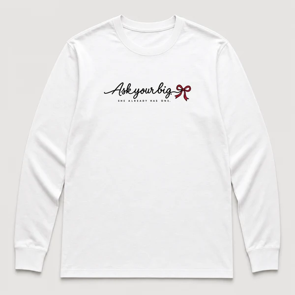 front view of a white long sleeve tee with a single script line across the chest