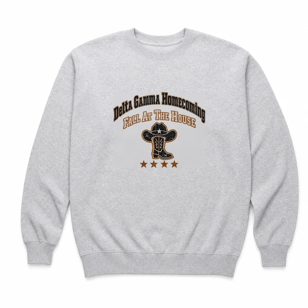 front view of an ash crewneck sweatshirt with an arched worn homecoming wordmark and a small anchor
