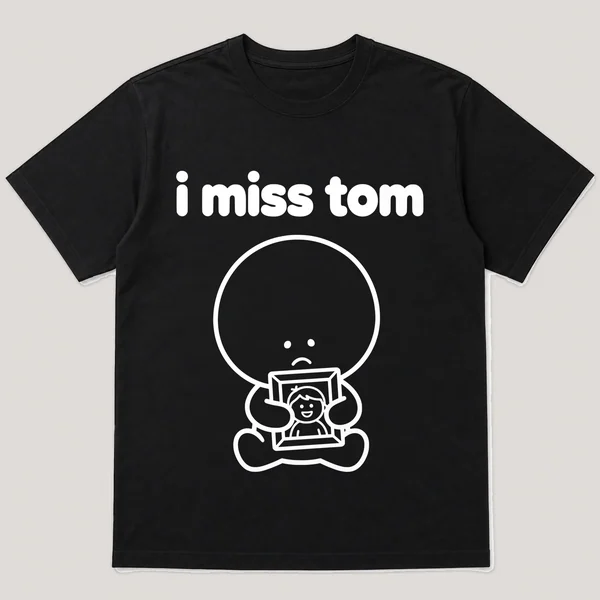i miss tom on a black tee, front view
