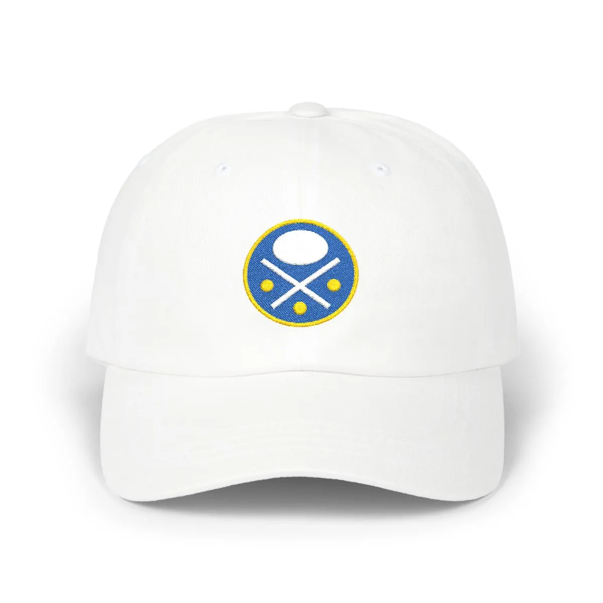 Abstract embroidered shapes in royal blue, white, and gold on a fabric cap.