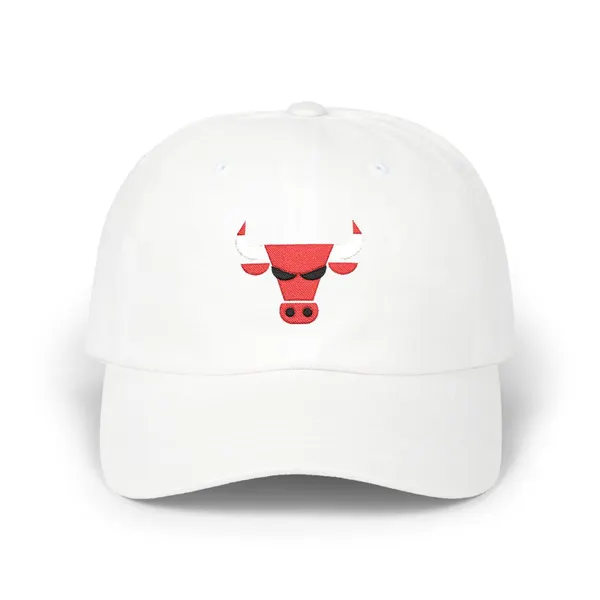 Embroidered abstract geometric shapes in red, white, and black on a cotton cap.