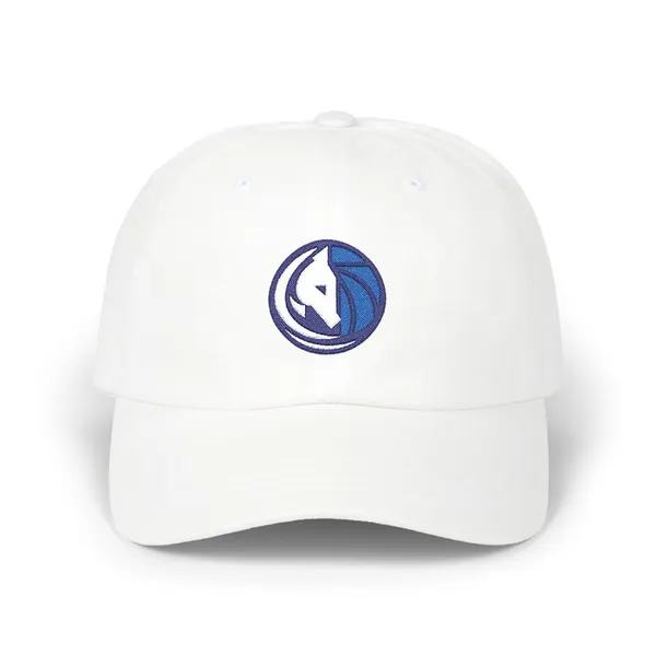 Embroidered abstract shapes in dark navy, off-white, and royal blue on a cotton cap.