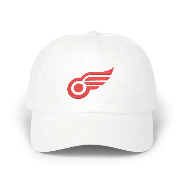 Abstract red geometric shapes embroidered on a cotton dad cap.