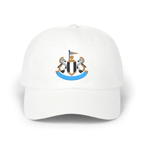 Abstract geometric embroidery in aqua, old gold, black, white, grey, and red on a cotton cap.