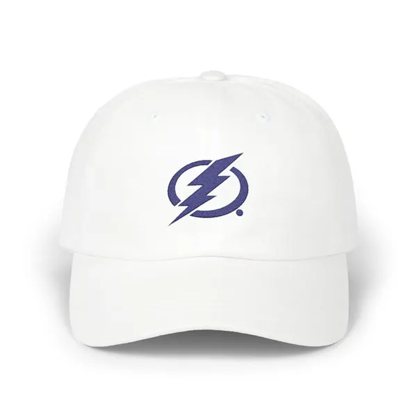 Abstract navy shapes on a dad cap, evoking Tampa Bay’s hockey culture.