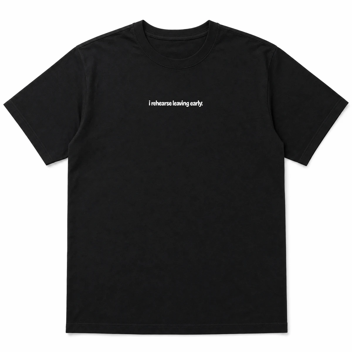flat lay mockup of a heavyweight tee in black and white, front view, with the printed line i rehearse leaving early across the chest