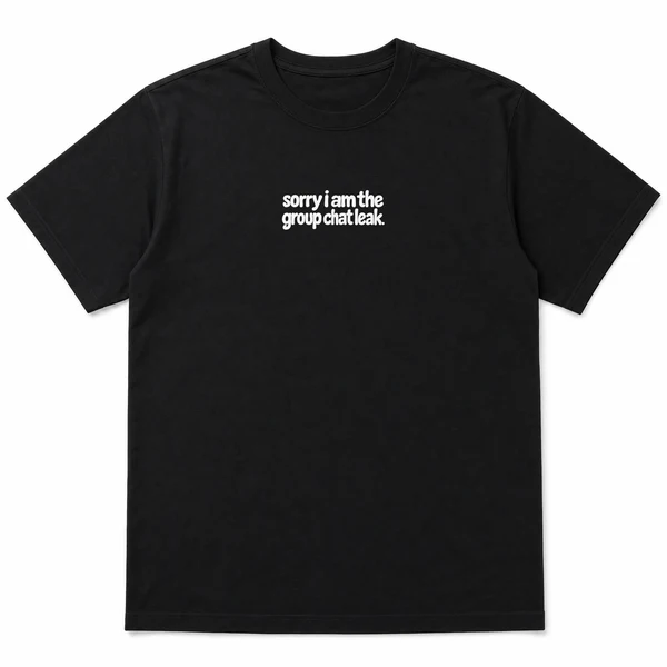 flat lay mockup of a heavyweight tee in black and white, front view, with the printed line sorry i am the group chat leak across the chest